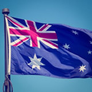 australian-flag-blue-sky-background-37410339