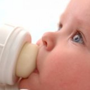 http://www.dreamstime.com/stock-photography-baby-drinking-his-bottle-image17761622