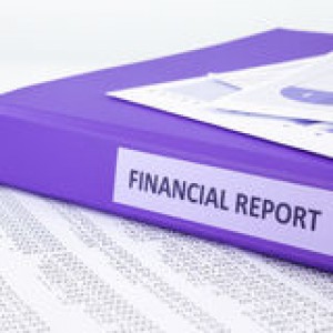 financial-accounting-report-sale-purchase-statement-purple-binder-place-concept-to-46090942