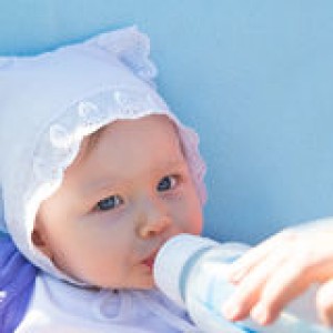 adorable-child-girl-infant-formula-bottle-drinking-milk-concept-food-baby-31953347