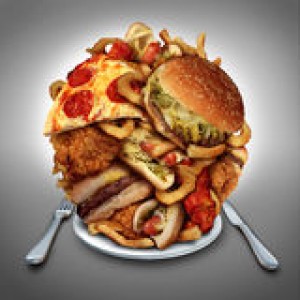 fast-food-diet-concept-served-plate-as-mountain-greasy-fried-restaurant-take-out-as-onion-rings-burger-hot-dogs-40995002