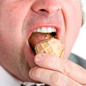 closeup-man-eating-ice-cream-photo-hungry-businessman-finishng-off-chocolate-waffle-cone-47217942