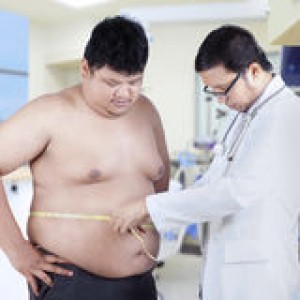 doctor-measuring-patient-obesity-examining-shot-hospital-42672378