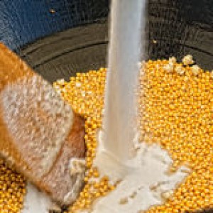 sugar-being-added-to-kettle-corn-9587347