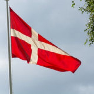 danish-flag-pole-summer-gray-clouds-background-41579471