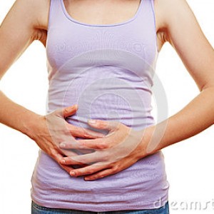 woman-bellyache-young-putting-hands-her-stomach-57697678
